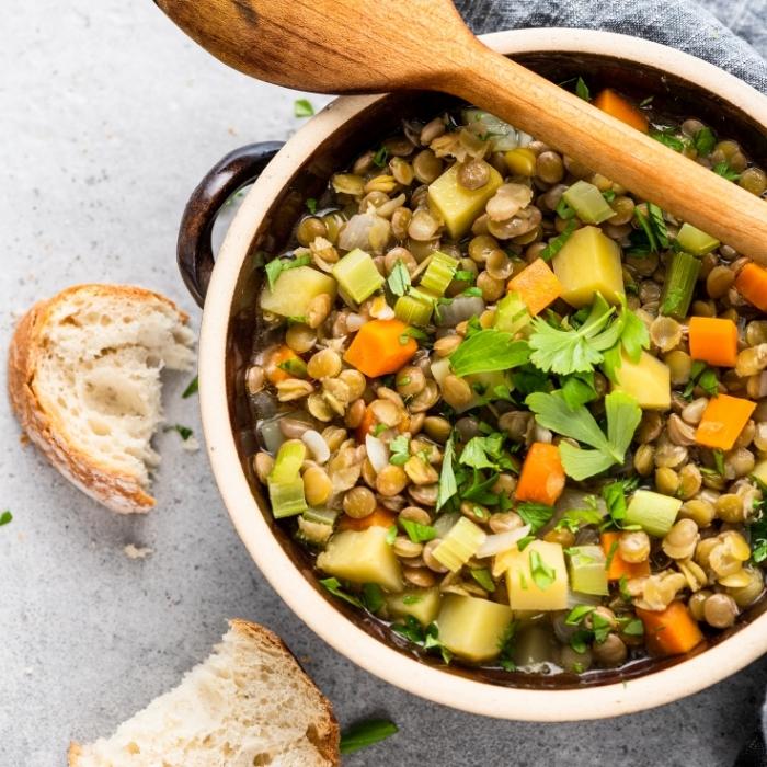 Hearty vegetable stew with lentils and a side of crusty bread.